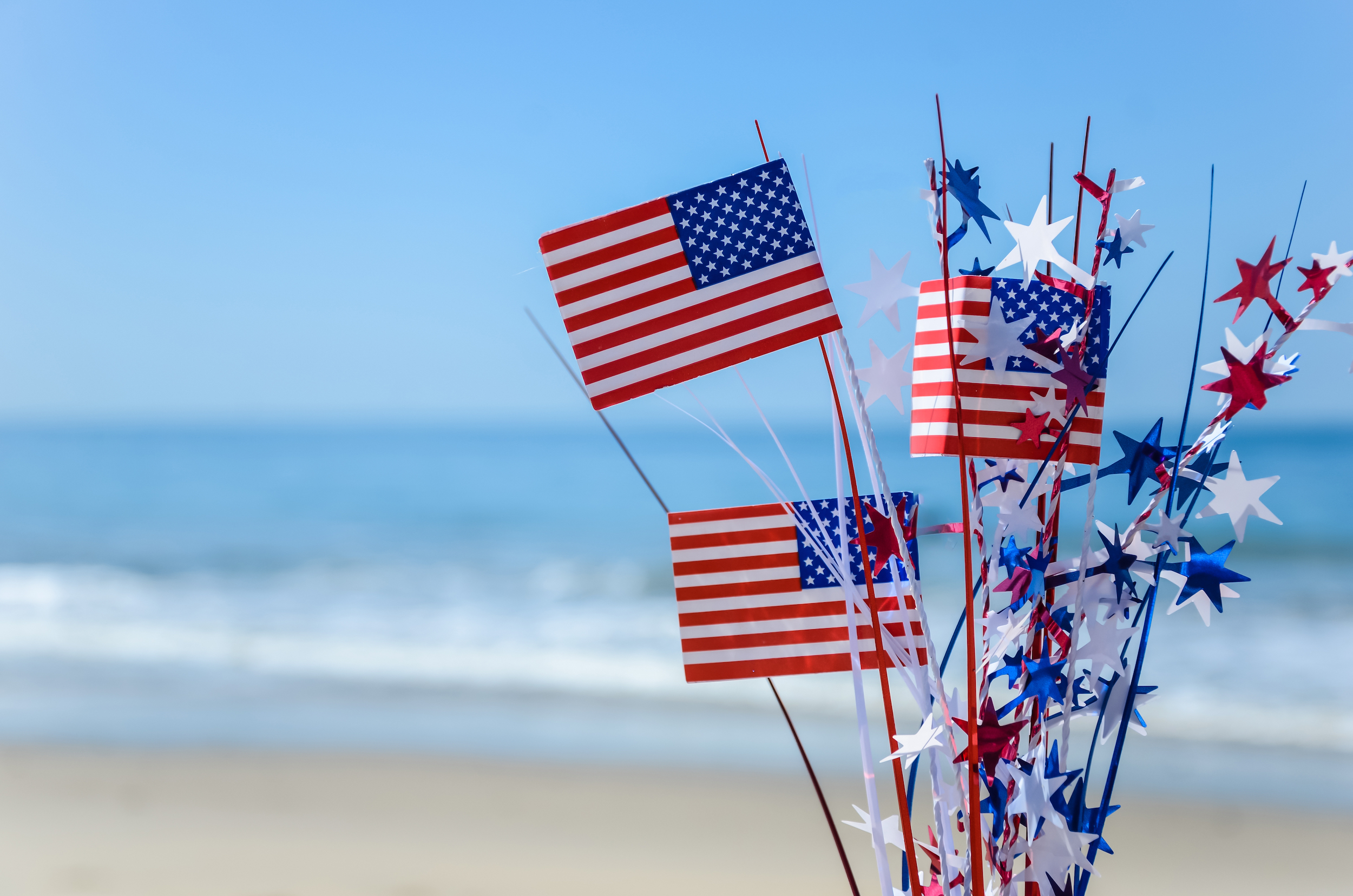 Patriotic,Usa,Background,With,Flags,And,Decorations,On,The,Sandy Best